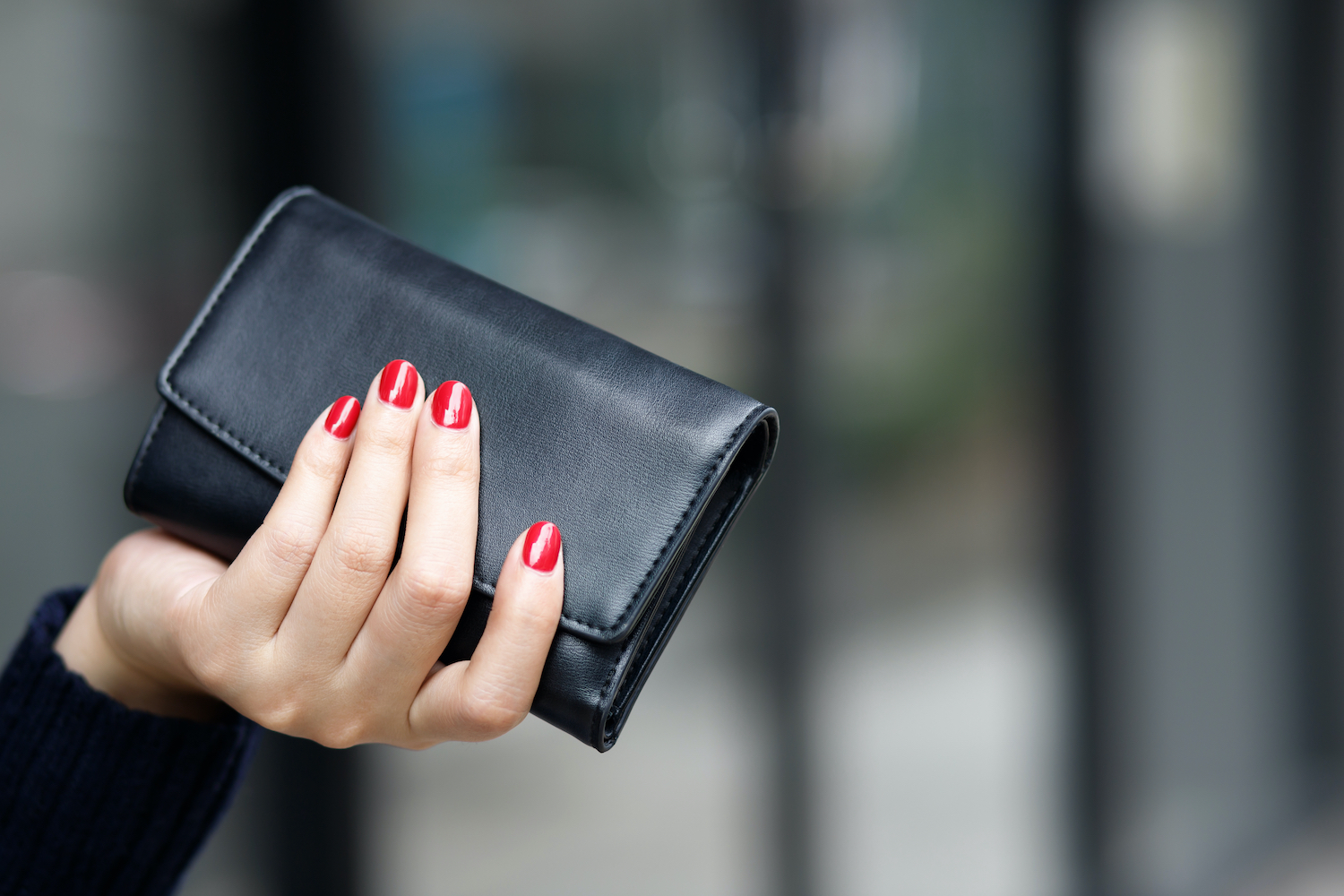 woman person holding a wallet in the hand. Cost control expenses